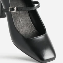 Babies à talon noire cuir