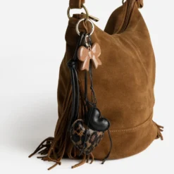 Bijoux de sac avec cœur motif léopard et noeud