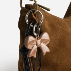 Bijoux de sac avec cœur motif léopard et noeud