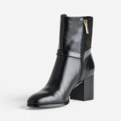 Boots noir bi-matière décor boucle