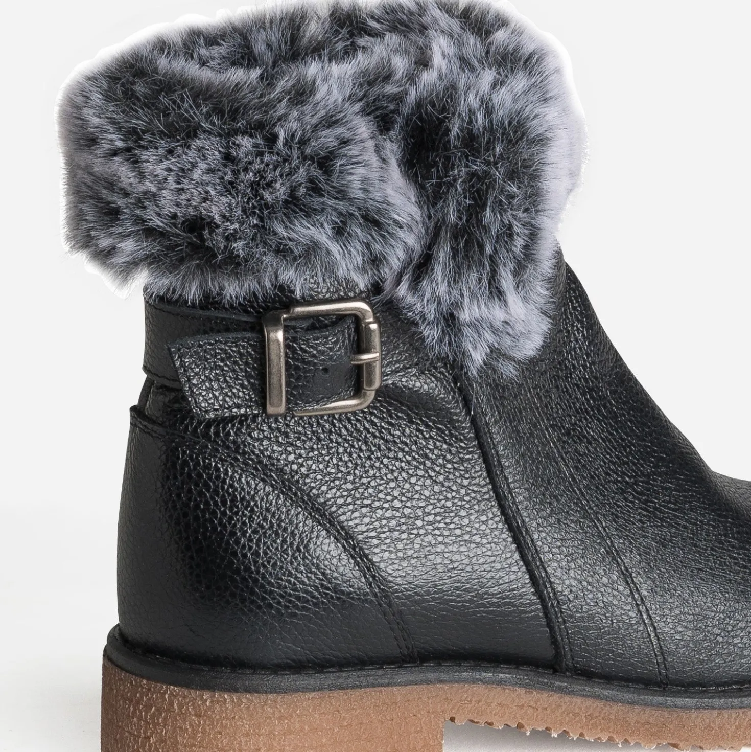 Boots noir cuir bride et tige fourrée