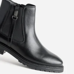 Boots noir cuir patte fantaisie