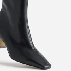 Boots noir cuir talon incurvé