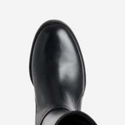 Botte noire cuir décor boucle