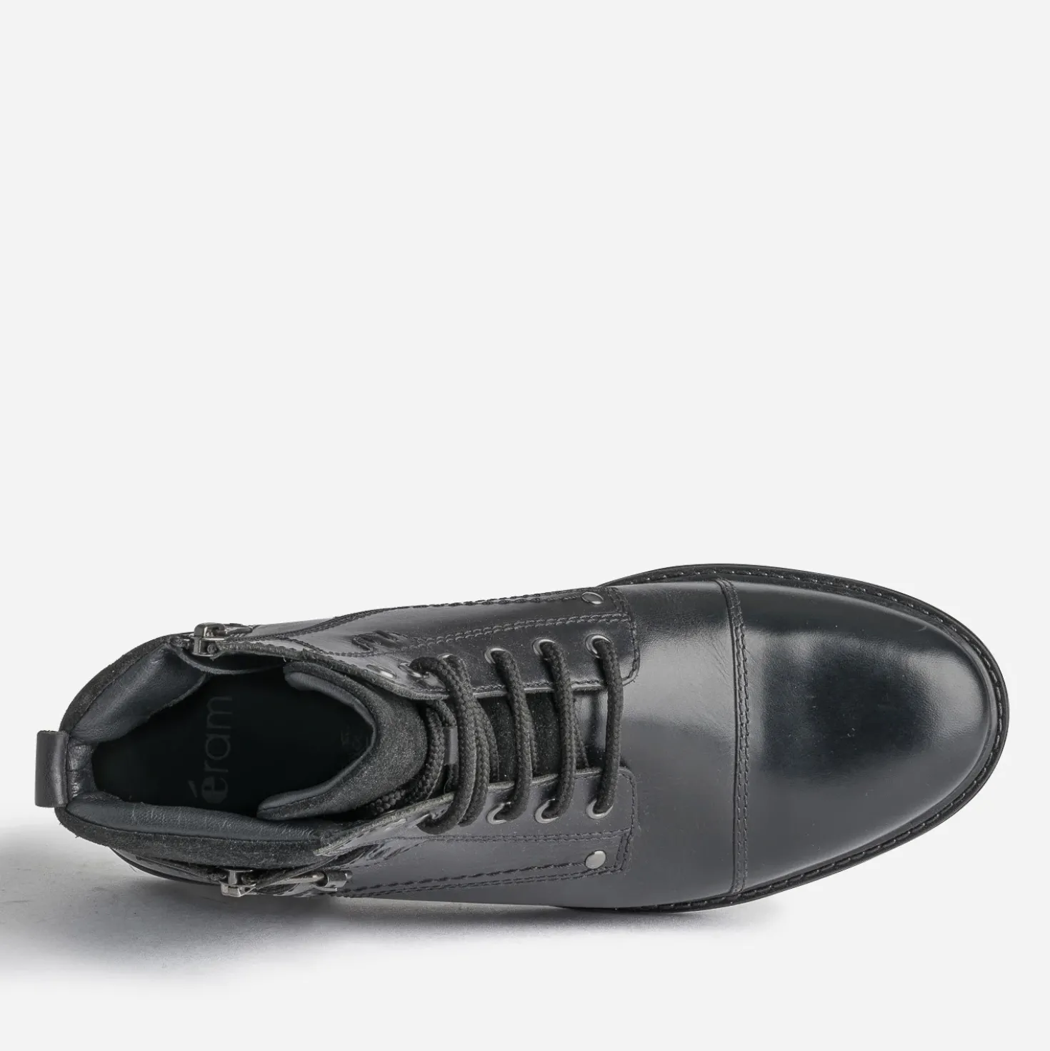 Bottine noire en cuir décor zip et boucle