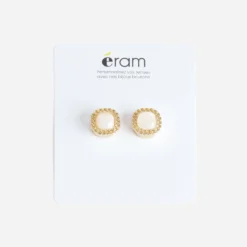 Boutons de manchettes en métal jaune et perles