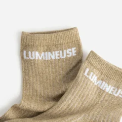 Chaussettes beiges pailletées à message