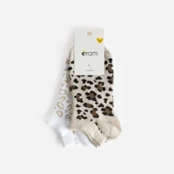 Chaussettes courtes blanches et motifs léopard