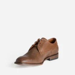 Derby cognac en cuir embossé