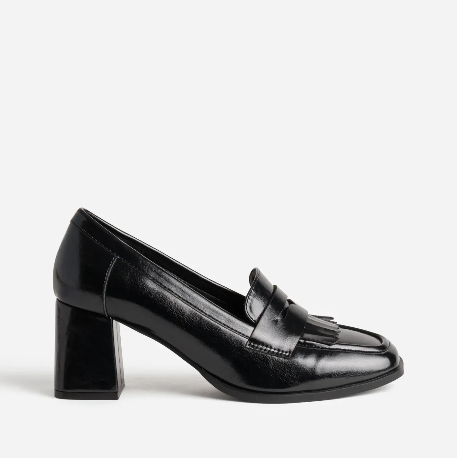 Mocassin à talon noir patte frangée