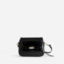 Sac à main noir fermoir doré