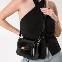 Sac à main noir fermoir doré