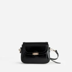 Sac à main noir fermoir doré