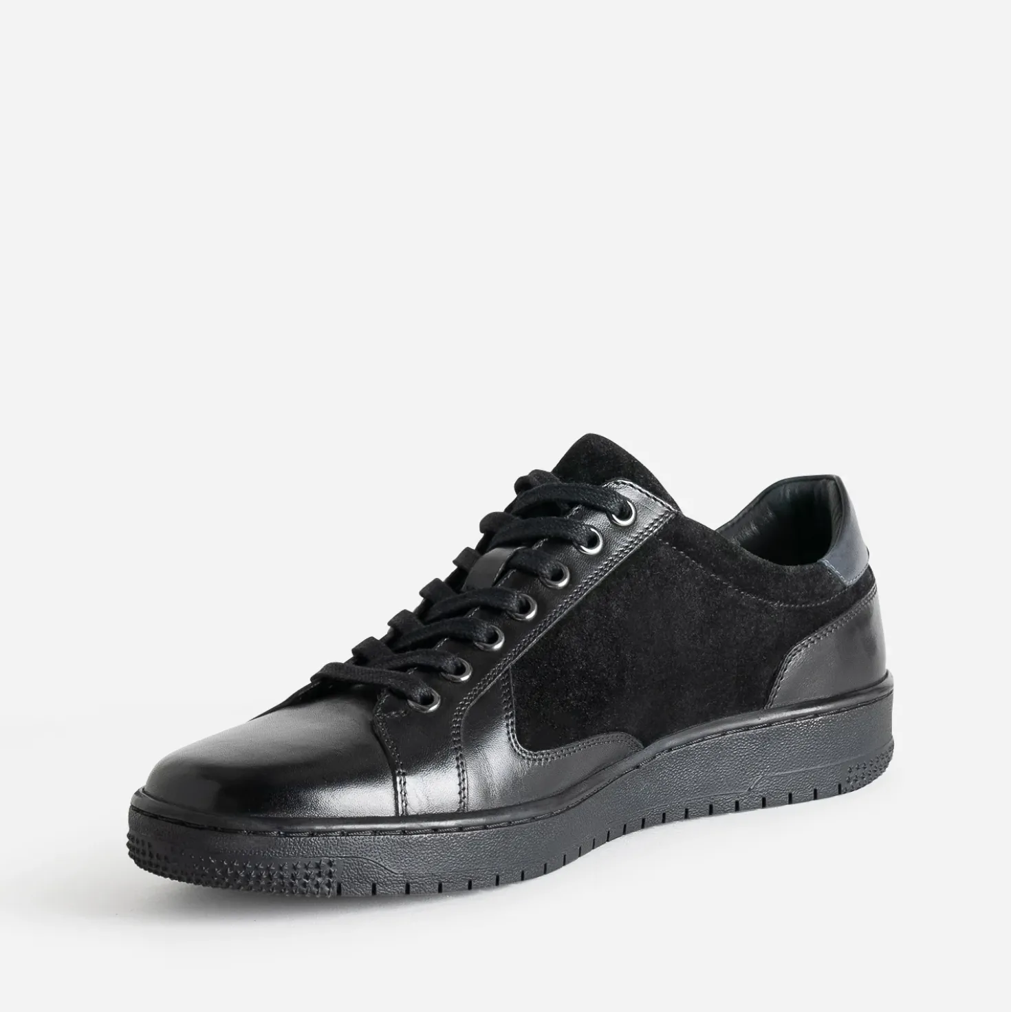 Tennis noir en cuir bi-matière