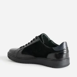 Tennis noir en cuir bi-matière
