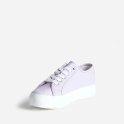Tennis toile violette à semelle blanche